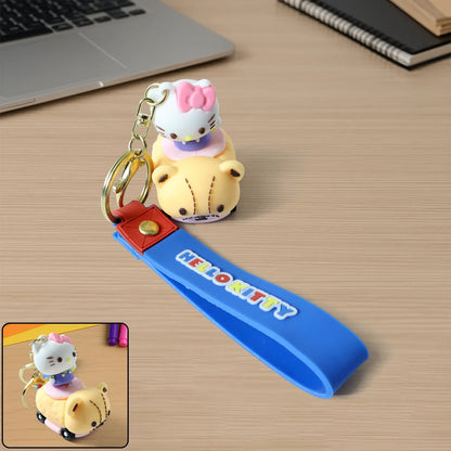 Cute Cartoon Cat Riding Toy Car Silicone Keychain (1 Pc) - Zidbik