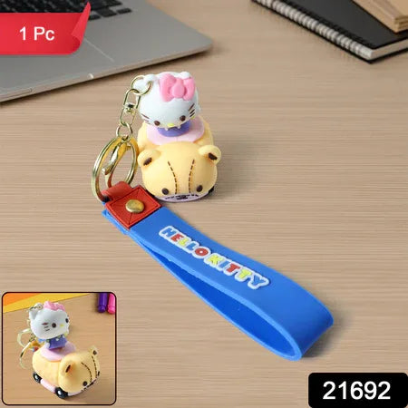 Cute Cartoon Cat Riding Toy Car Silicone Keychain (1 Pc) - Zidbik