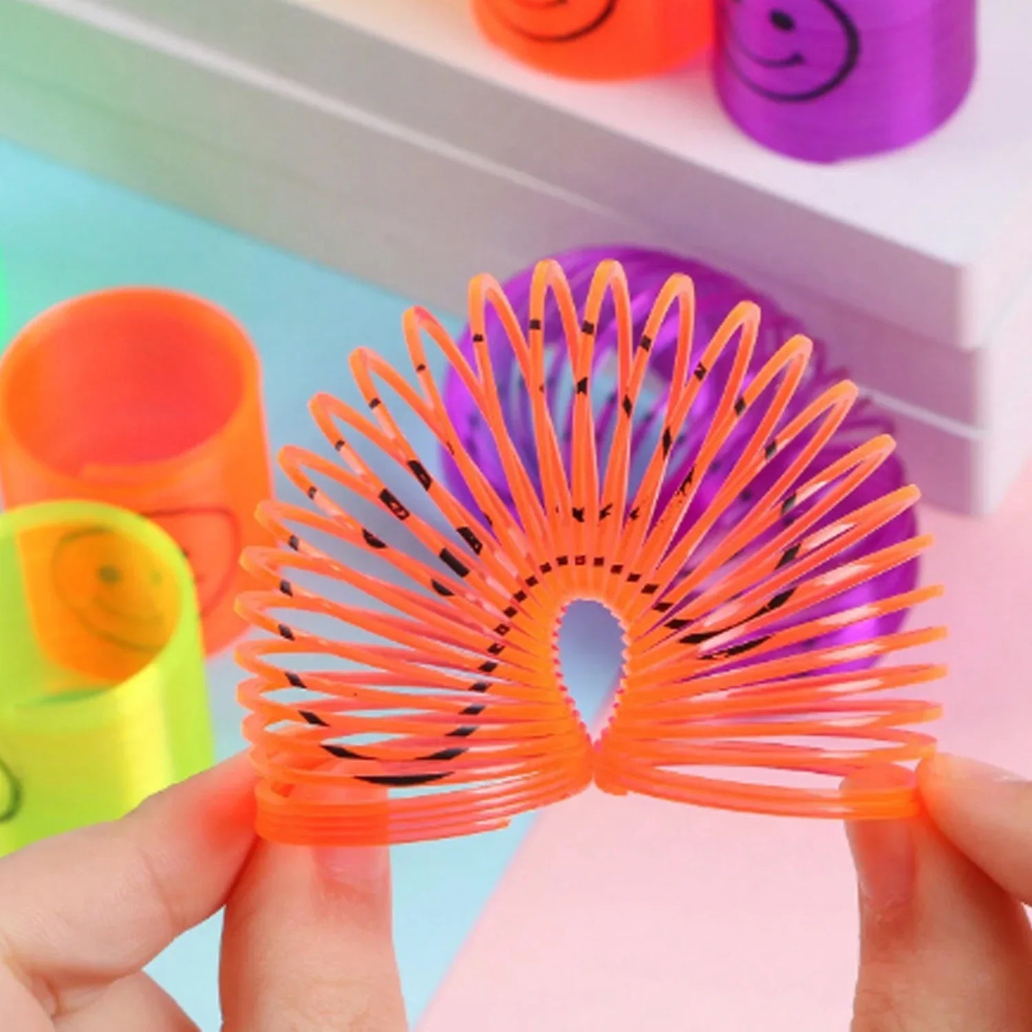 17745 Multicolor Magic Smiley Spring Spring Toys Slinky Slinky Spring Toy Toy For Kids For Birthdays Compact And Portable Easy To Carry (12 Pcs Set) - Zidbik