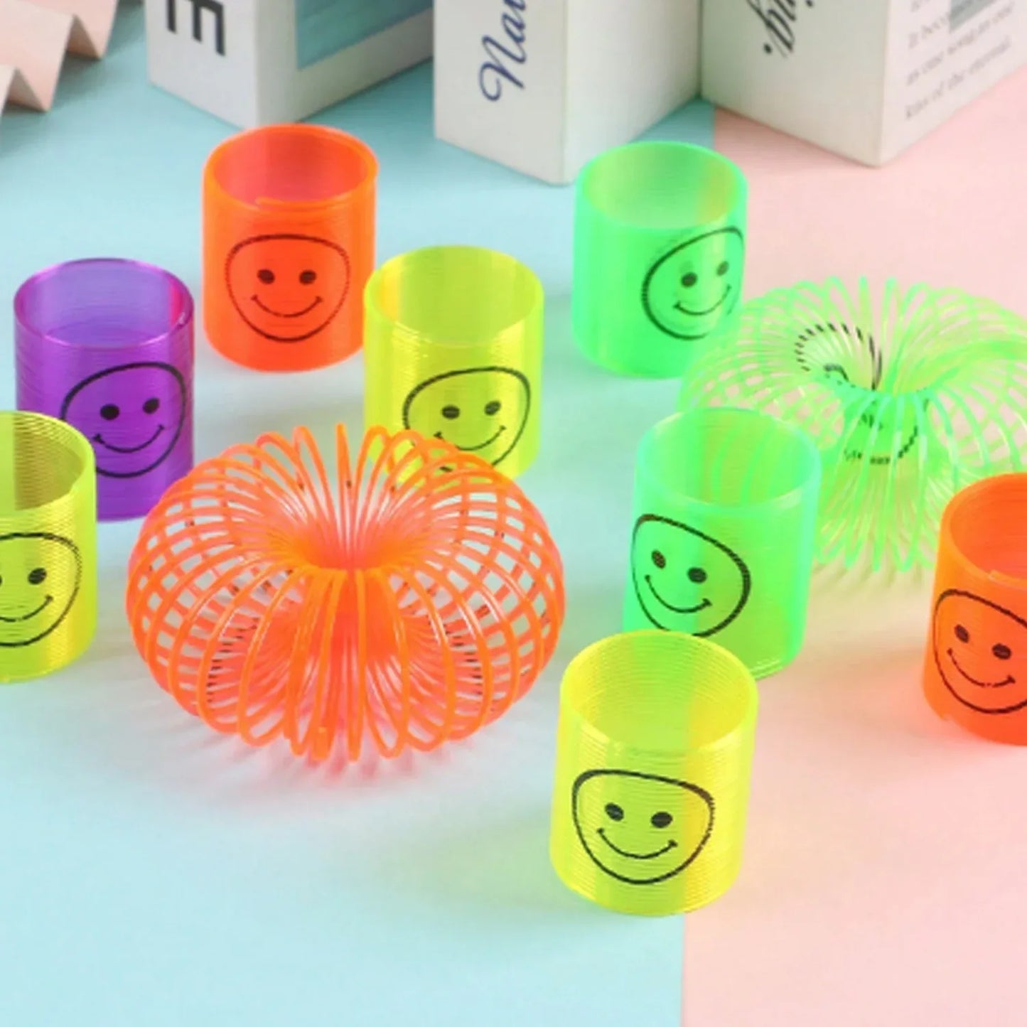 17745 Multicolor Magic Smiley Spring Spring Toys Slinky Slinky Spring Toy Toy For Kids For Birthdays Compact And Portable Easy To Carry (12 Pcs Set) - Zidbik